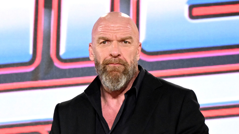 Triple H with a sly grin