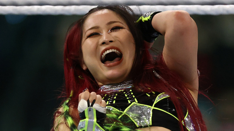 IYO Sky pumps her fist after scoring a big move