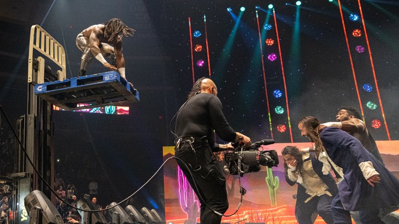 Swerve Strickland moment before leaping onto The Young Bucks and Powerhouse Hobbs, AEW Double or Nothing 2025.