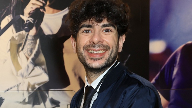 Tony Khan, happy as can be