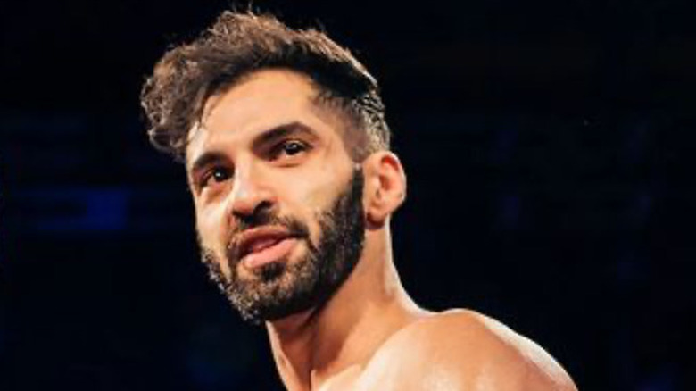 Ari Daivari smirking