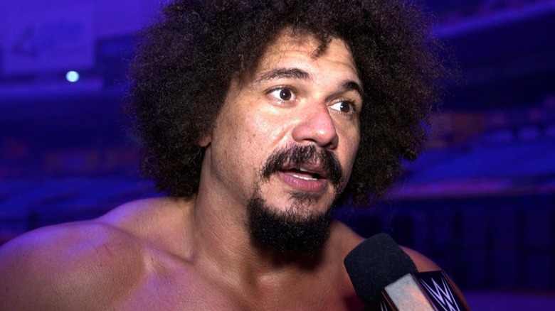 Carlito backstage being interviewed