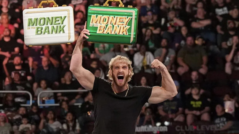 Logan Paul holding the Money in the Bank case