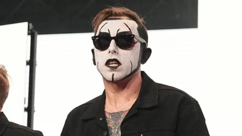 Danhausen wearing sunglasses at night