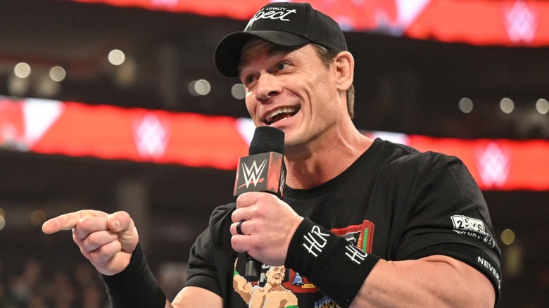 John Cena pointing with amusement