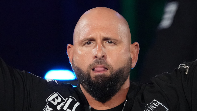 Karl Anderson showing his tongue 