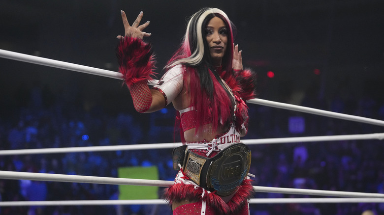 AEW star Mercedes Mone poses on the ropes, TBS Championship around her waist, during the December 31, 2025 episode of 