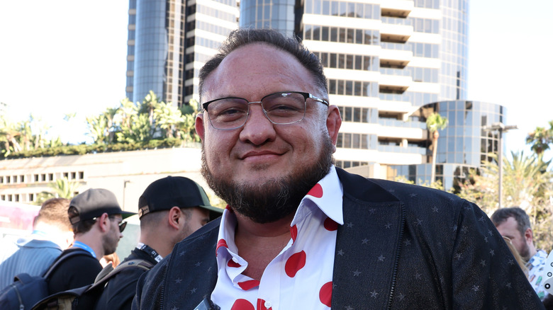 Samoa Joe wearing a polka dot shirt
