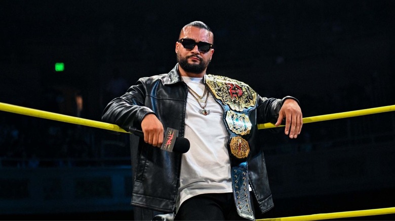 TNA World Champion Mike Santana leans in the corner of the ring during an episode of 