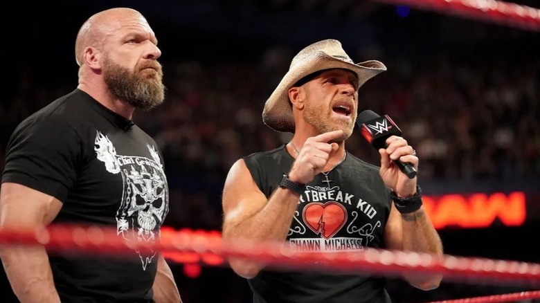 Triple H and Shawn Michaels call out challengers during a promo on 