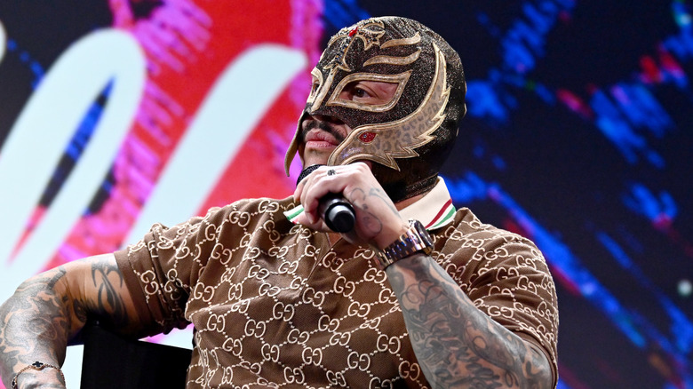 Rey Mysterio prepares to answer a question