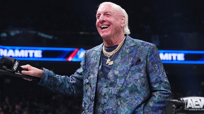Ric Flair laughing in an AEW ring