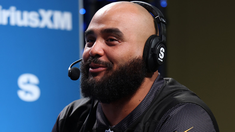 AJ Francis wearing a headset