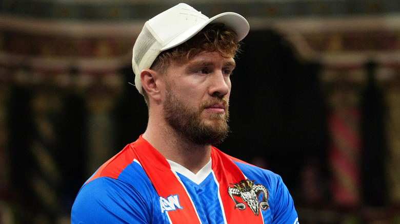 Will Ospreay wearing a jersey and white hat on AEW Dynamite