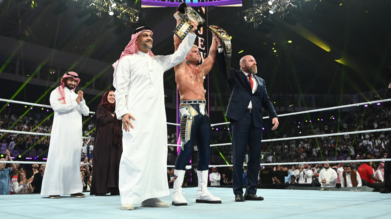 Cody Rhodes lifts the WWE Crown Jewel Title