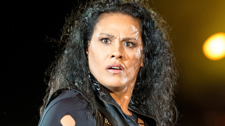 Tamina wearing black ring gear