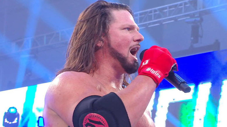 AJ Styles speaks to the NXT 2.0 crowd.