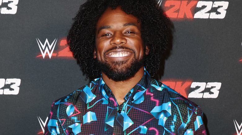 Xavier Woods is smiling