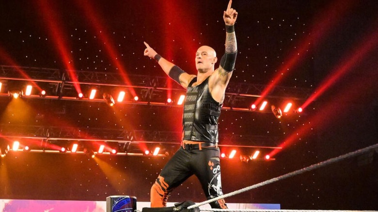Baron Corbin poses on the ropes before a match on WWE programming, during his first run with the company.