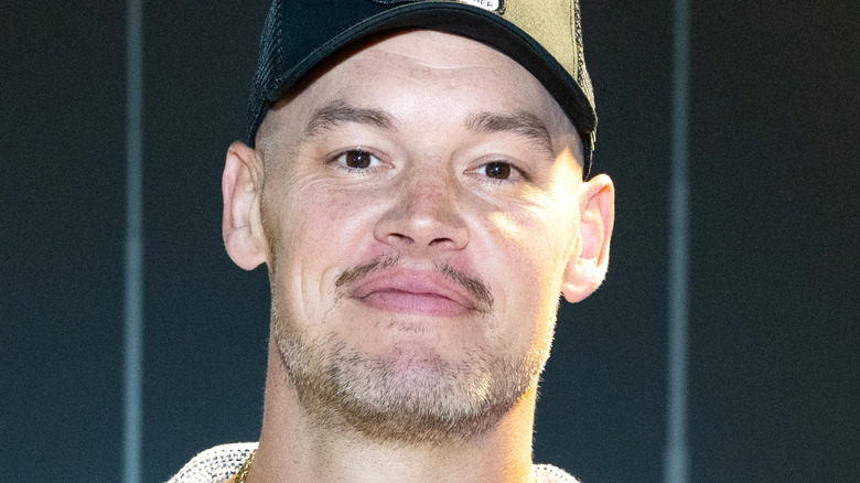 Baron Corbin at an indoor golfing range