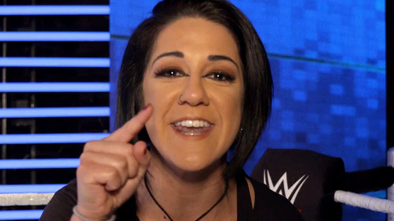 Bayley points to the camera during WWE promo