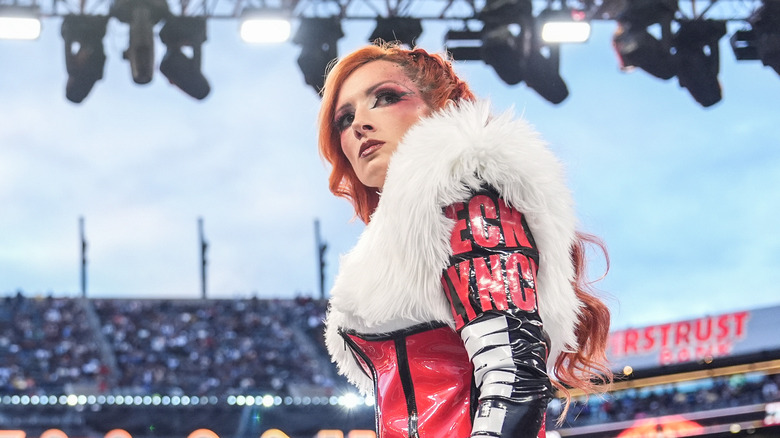 Becky Lynch looks off into the distance