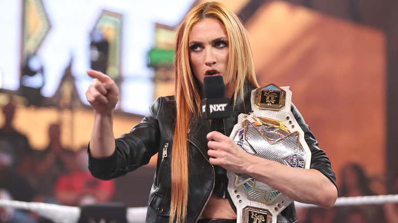 Becky Lynch making a point with her title
