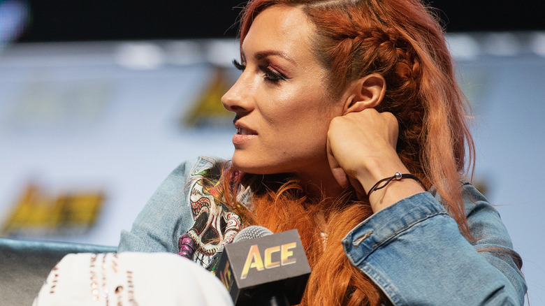 Becky Lynch holding microphone