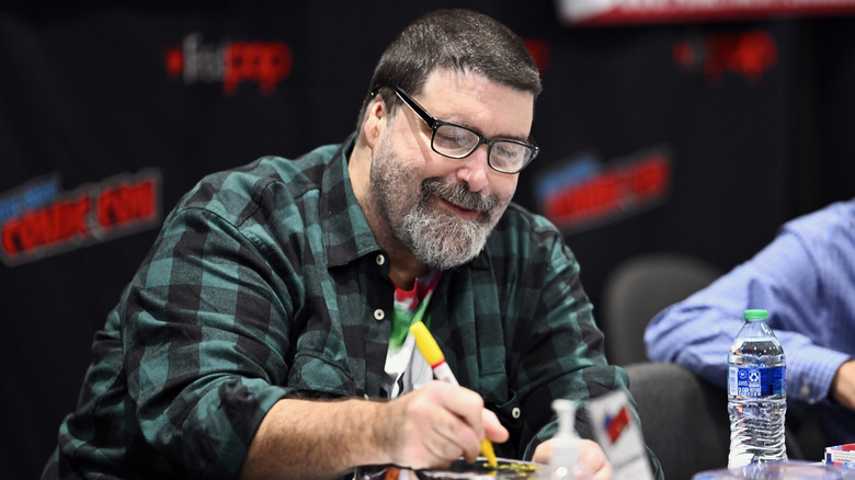 Mick Foley signs autographs during New York Comic Con