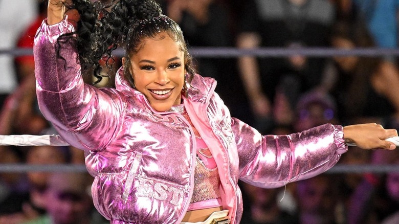 WWE Superstar Bianca Belair enters the ring to defend her Raw Women's Championship against IYO SKY.