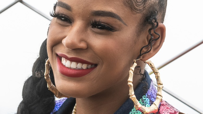 Bianca Belair poses with the "RAW" Women's Championship