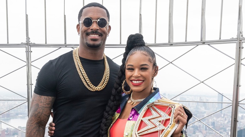 Bianca Belair and Montez Ford smiling
