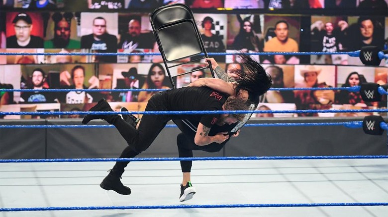 edge-spear-reigns-smackdown