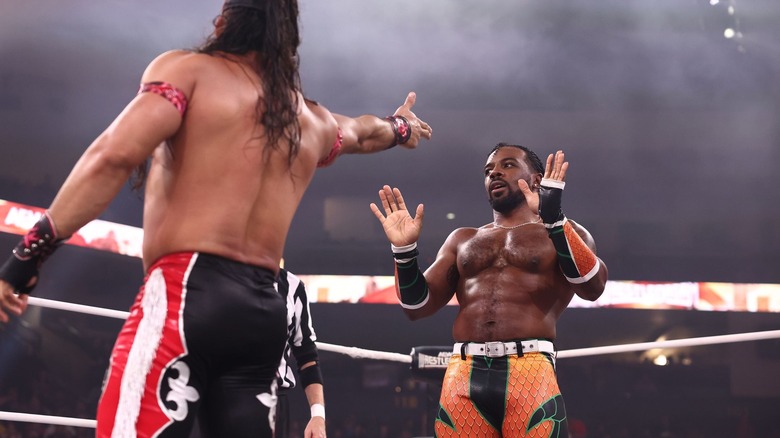 Austin Creed backs off from Bandido's finger gun.