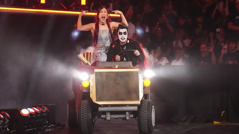 IYO SKY hits her emote as Danhausen drives her in the Danhausen-mobile to the ring during the July 20, 2026 edition of "WWE Raw."
