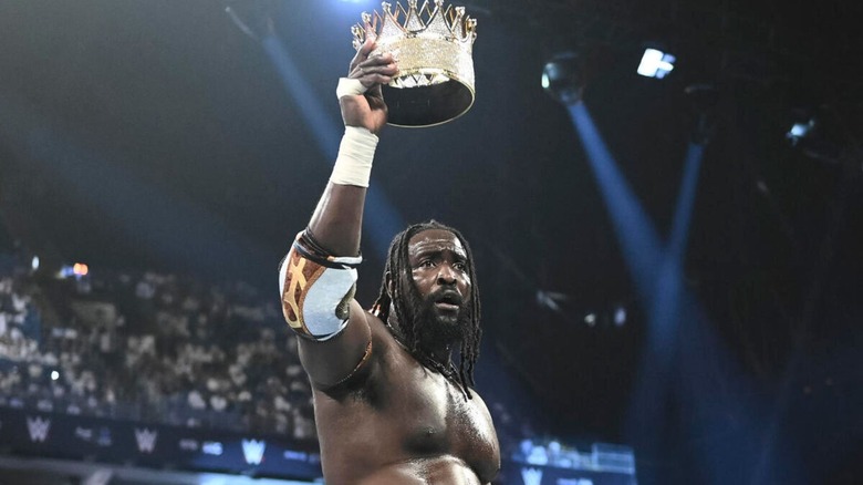 Oba Femi holds up the King of the Ring crown after his victory over Jey Uso at WWE Night of Champions 2026.