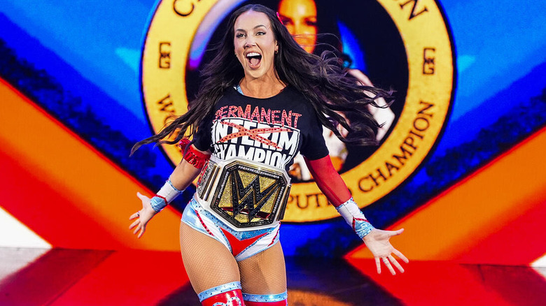 Chelsea Green makes her entrance wearing the interim women's title on "WWE SmackDown"