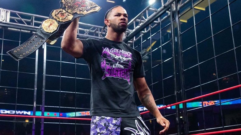 Leon Slater holding up a championship belt at TNA Lockdown 2026
