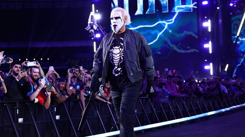 Sting walks down the ramp toward the ring to assist Darby Allin in his TNT Championship match against Kevin Knight at AEW All In 2026.