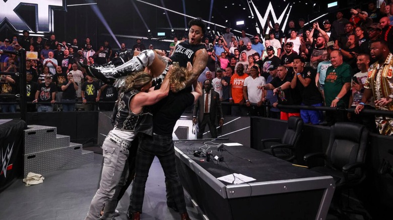 BirthRight teams up to power bomb Zilla Fatu through the commentary desk on the September 8, 2026 edition of "WWE NXT."