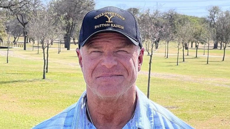 Billy Gunn wearing a hat