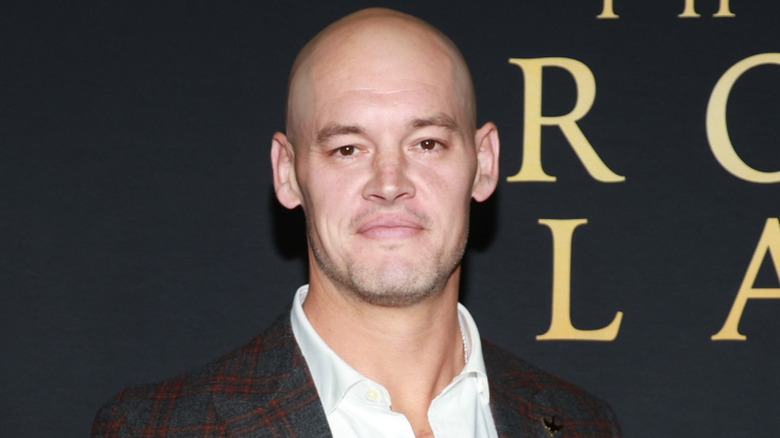 Bishop Dyer (fka as WWE star Baron Corbin) poses on the red carpet