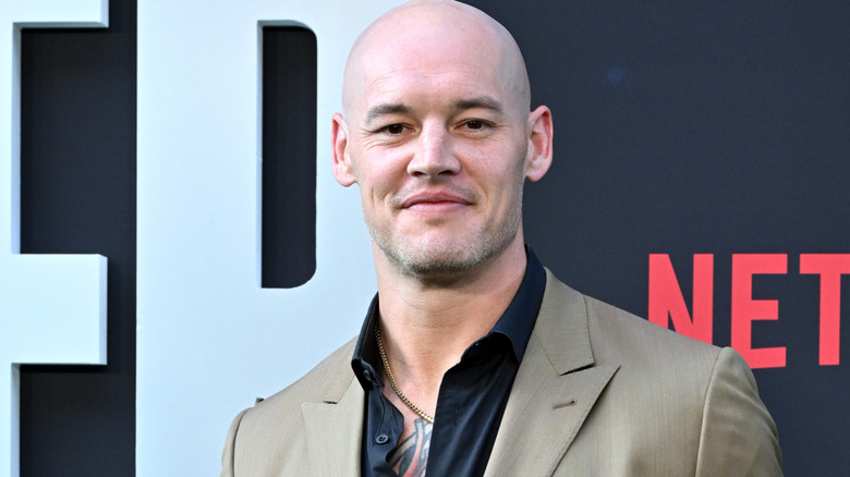 Bishop Dyer wearing a grey suit