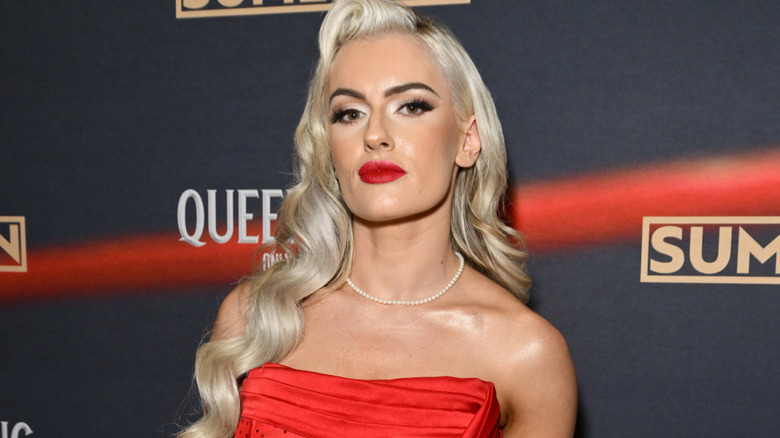 Blake Monroe wearing a red dress