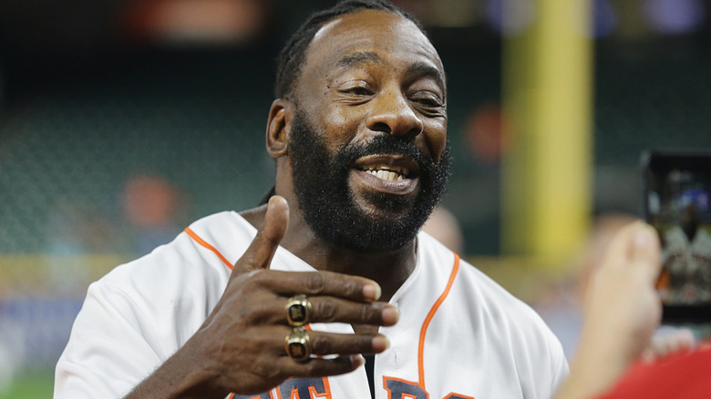 Booker T wearing his WWE Hall of Fame rings
