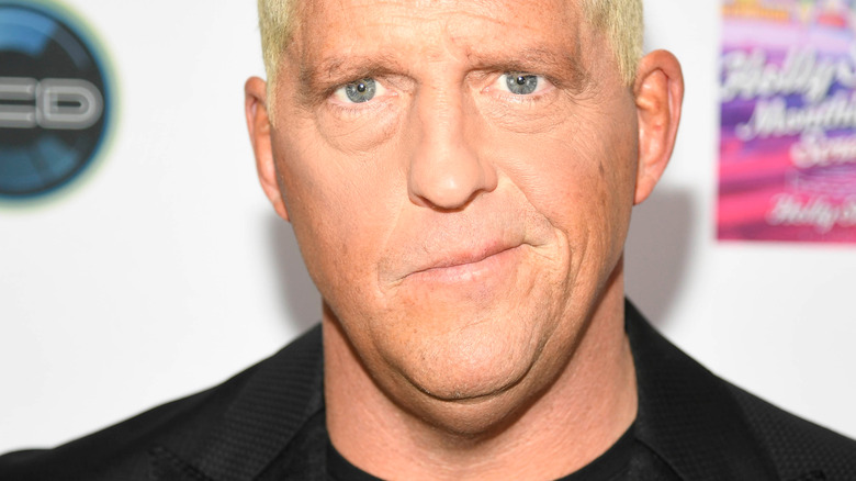 Dustin Rhodes smirking