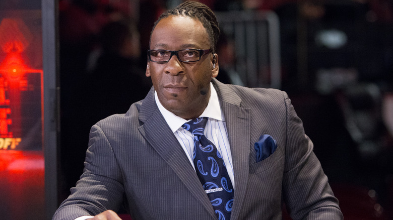 Booker T wearing glasses