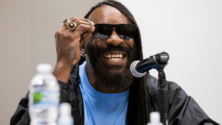 Booker T is wearing sunglasses