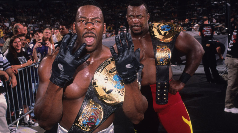 Harlem Heat with WCW Tag Titles