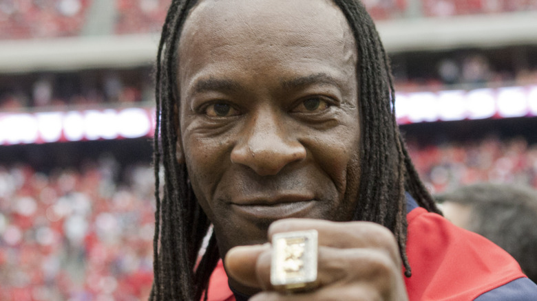 Booker T pointing his fist towards the camera during a visit to the Reliat Stadium. Houstan, Texas, 2012.